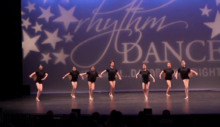 Stage dancers continuation, frame at 1–2 seconds